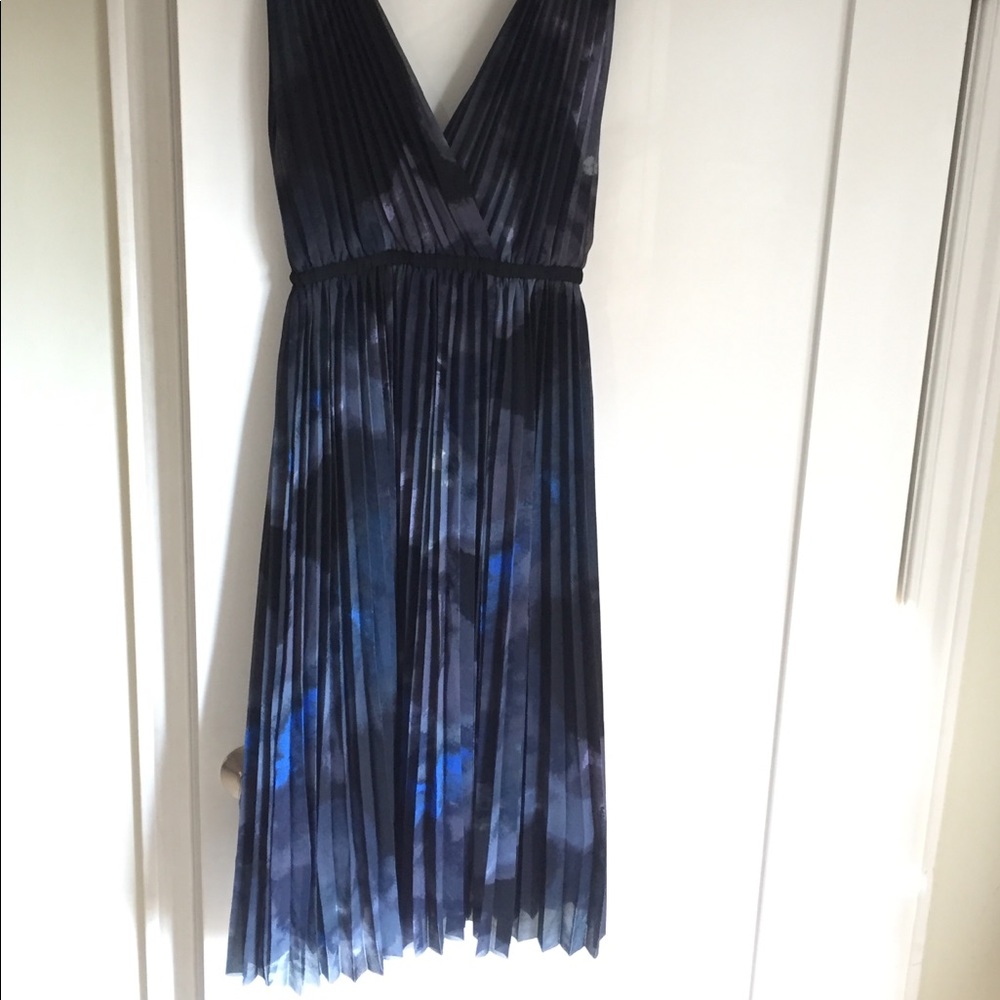 V-neck, pleated skirt dress